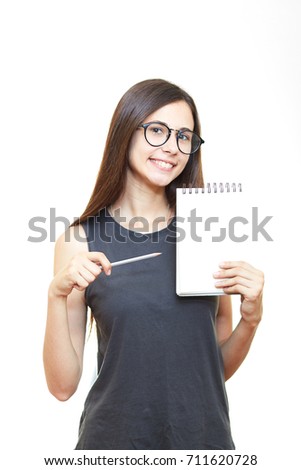 Smiling business woman holding pads of notepaper on white background