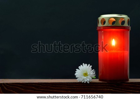 All Saints Day burning candle Royalty-Free Stock Photo #711656740