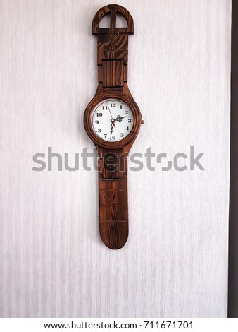 A wall clock isolated on the white background. A concept of time management. 
