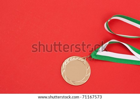 Blank winning medal, in red background