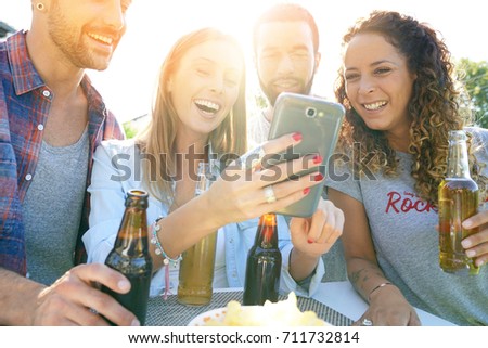 Group of friends having fun taking selfie pictures