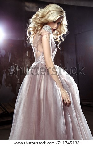 Beautiful blonde young bride woman in color wedding dress. rock style, fashion beauty photo
