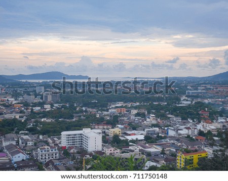 This is a panoramic view on the mountain viewpoint. See the city and the sea in the distance. Beautiful evening sky It is a great place to take pictures and relax.