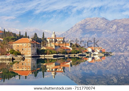 View of seaside town of Prcanj in winter. Bay of Kotor (Adriatic Sea), Montenegro Royalty-Free Stock Photo #711770074