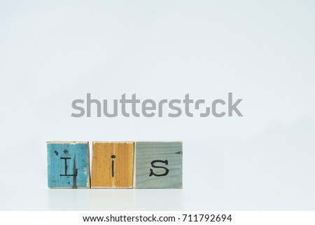 Lis. Wooden letters on white background