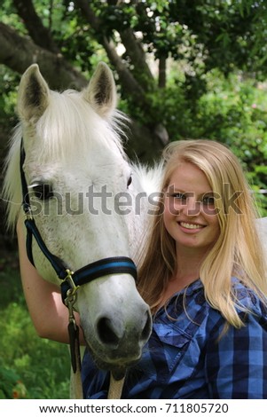 Beautiful blonde and her horse
