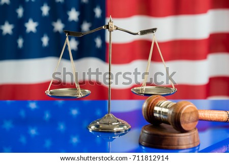 Law symbol  on American flag, closeup