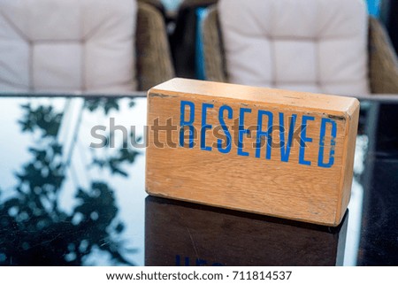 Table at retaurant with reserved sign