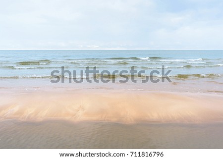 Soft waves on the sandy beach
