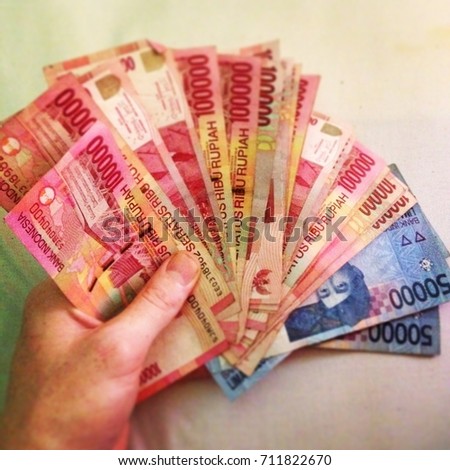 The money of Indonesia in the hands
