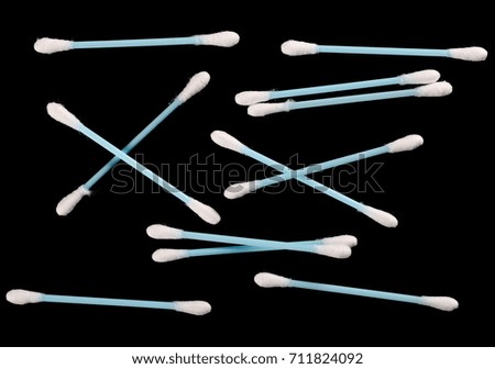Soft cotton swabs isolated on black background