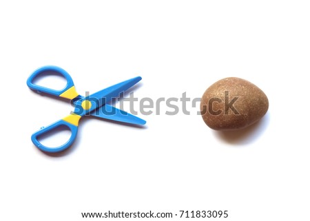 Scissors vs. Rock on White Background