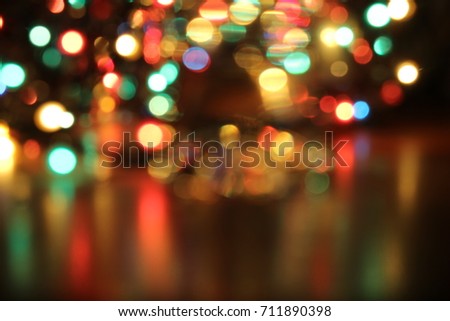 Abstract circular bokeh, elegant background of festive christmas lights, defocused photo.