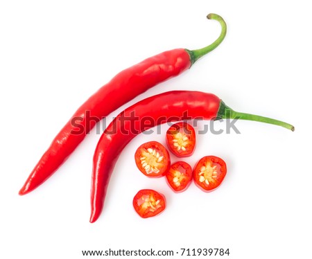 Closeup top view red chili pepper with sliced on white background, raw food ingredient concept Royalty-Free Stock Photo #711939784