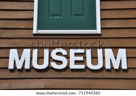 Museum sign in wooden board