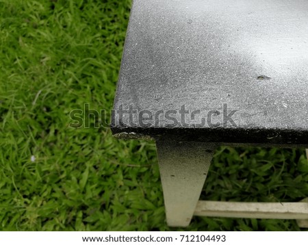 wooden abstract white chair in garden.mobile photography.