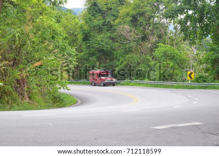 Curved road on the hill chiengmai thailand.