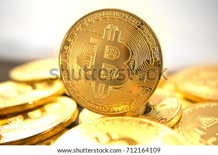 Bitcoins - Gold Coins - Cryptocurrency with space for your own text - Concept