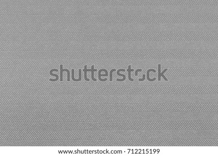 Gray grunge surface empty parchment sheet. Dirty art poster above folds angle craft focus light scene. High resolution photo.