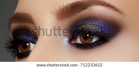 Makeup and cosmetics. Beauty perfect face. Close-up of woman eye with beautiful arabic makeup Royalty-Free Stock Photo #712233622