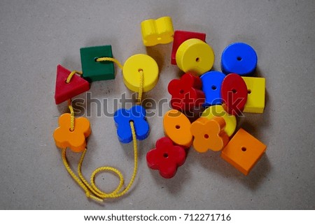 Many colorful plastic shaped toys for kids practice and good development and learning process.