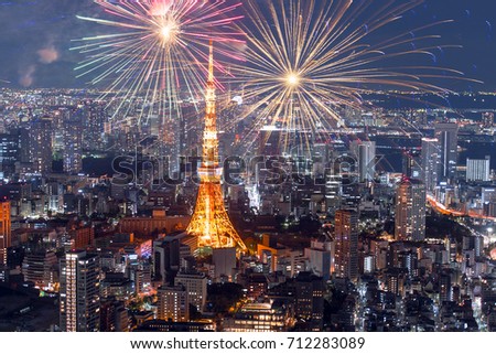 Amazing panoramic view to city centre of Tokyo with fireworks in the evening, Tokyo Tower at night