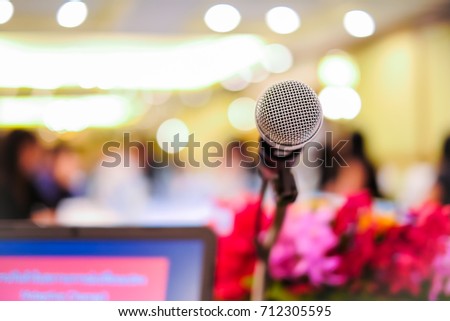 Microphone soft focus on blur abstract background in meeting room, business and educational concept