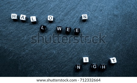 lettering on a black background "helloween night"