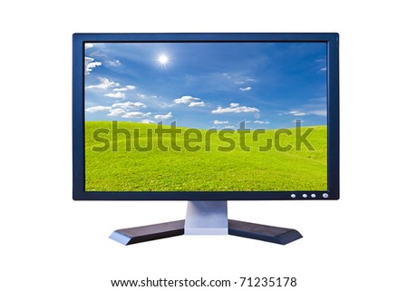 LCD Monitor with green grass meadow isolated