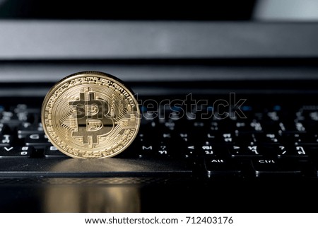 Abstract,Golden Bitcoin money on computer.