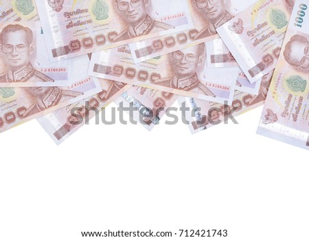 Thai money a stack of 1000 banknotes isolated on white background