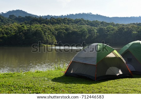 recreation & outdoor concept :  camping site with lake and park  background  at  Saraburi, Thailand 