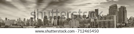 Midtown Manhattan eastern side panorama. Wonderful hi-res view from Brooklyn on a cloudy day.