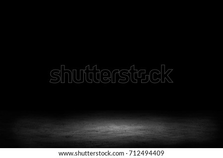 Dark room with tile floor and brick wall background Royalty-Free Stock Photo #712494409