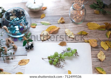 Grape of grapes on a wooden background. Autumn still life