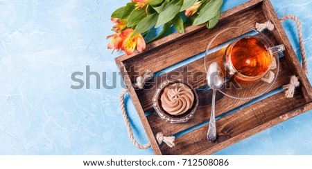 Photo of tray with cup , cake