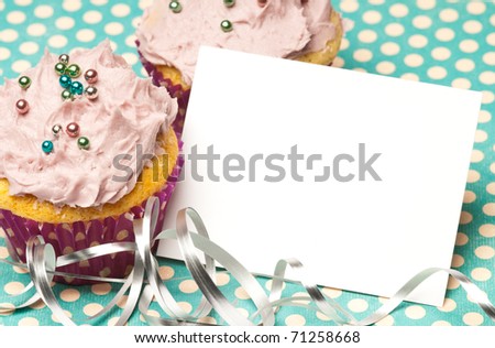 Cupcakes with a blank paper to write your own message