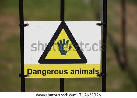 Warning sign of dangerous animals and Electric fences