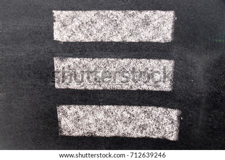 White chalk paint texture on black board background for decoration or grunge layer