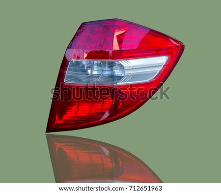 Car tail lights separate from background.