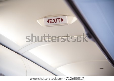 Exit sign on the plane