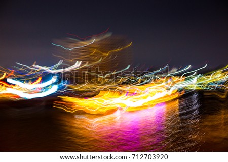 Abstract background of light motion in the river at night,Blurred background