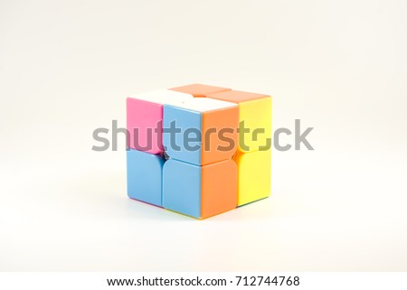 plastic cubic toy on white isolated background.