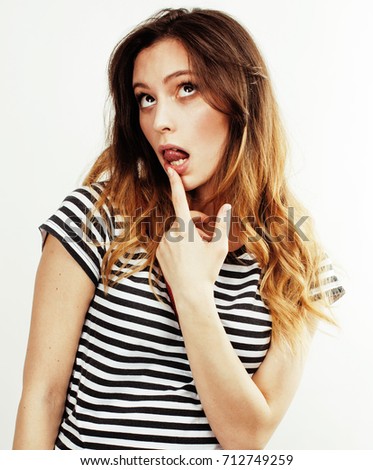 young pretty teenage hipster girl posing emotional happy smiling on white background, lifestyle people concept 
