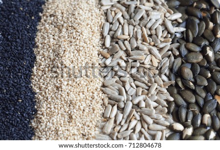 Mixed seeds as low carp super food on white background