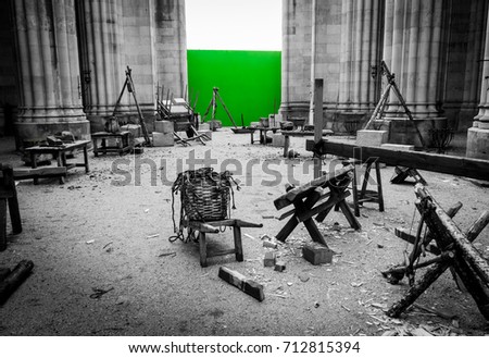 Set of filming, various objects to create a medieval atmosphere during a shoot.Green screen