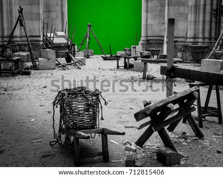 Set of filming, various objects to create a medieval atmosphere during a shoot.Green screen
