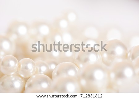 Pile of pearls on the white background Royalty-Free Stock Photo #712831612