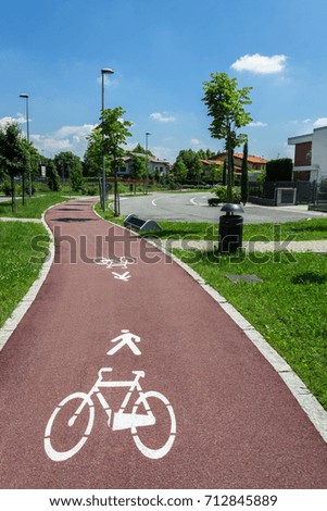 Road marking of the bicycle path and a parking in a district