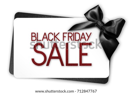 Black Friday sale text write on white gift card with black ribbon bow